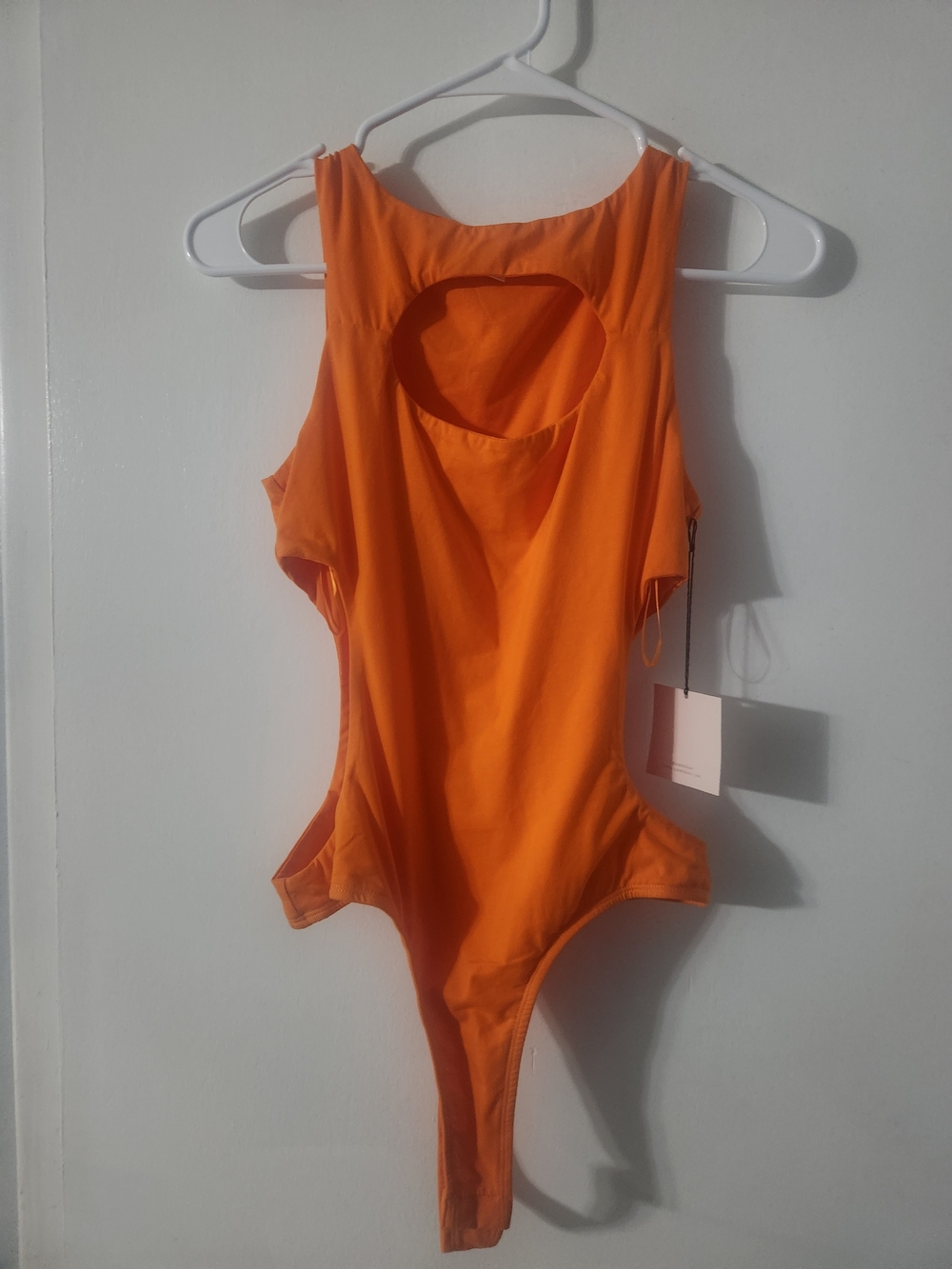 superdown Orange Cutout One-Piece Bodysuit